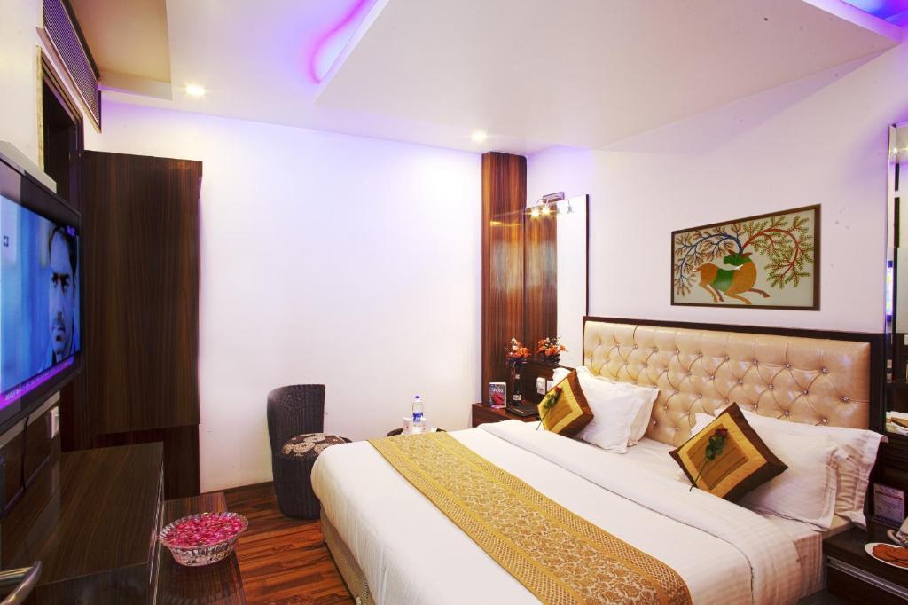 Hotel Delhi 55 -City Center Neu-Delhi Zimmer foto